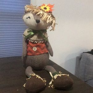 Harvest, fall decor sitting fox. W/ sunflower hat.